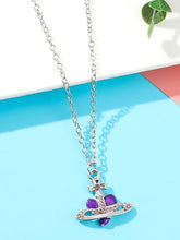 Halskette mit Kreuz- und Herzanhänger aus Strass